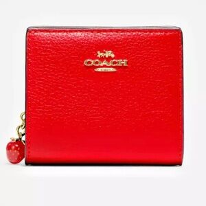 Coach snap pebble strawberry charm wallet